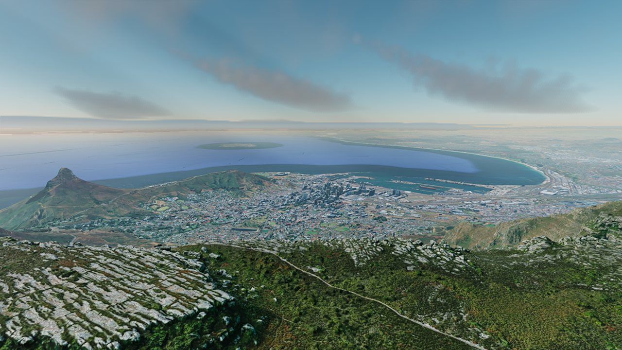 Cumulus clouds drifting over Cape Town's bay in afternoon light